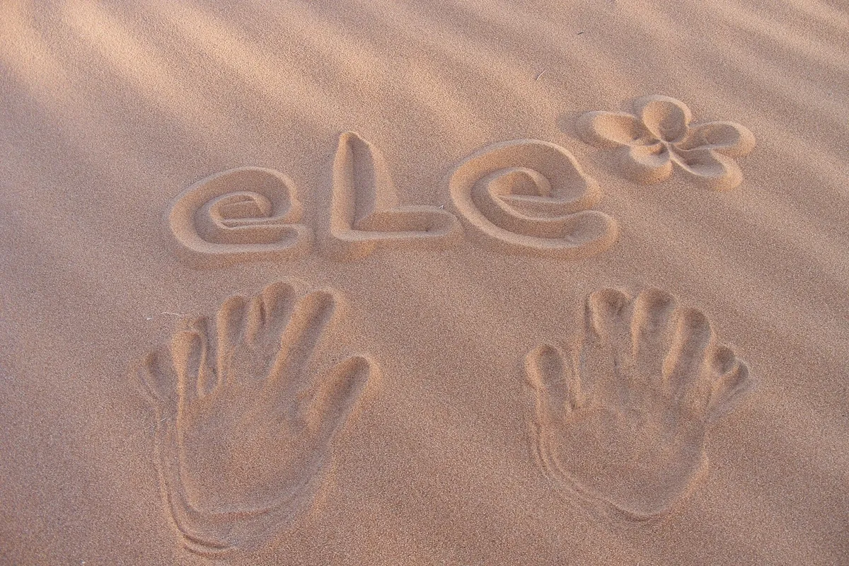 Merzouga to Ouzina desert tour – handprints in the sand of Erg Ouzina
